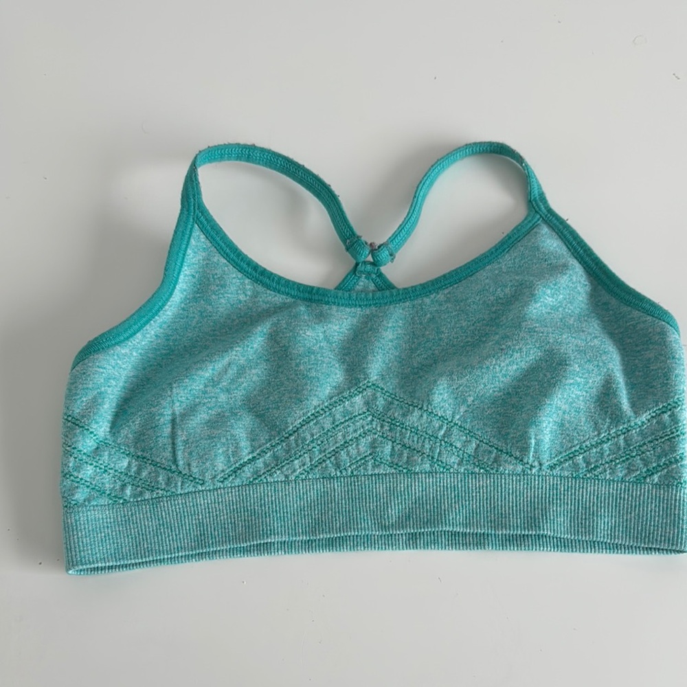 Reebok girls Teal Sports Bra. Racer back. Fun design. Size med (10-12yr)